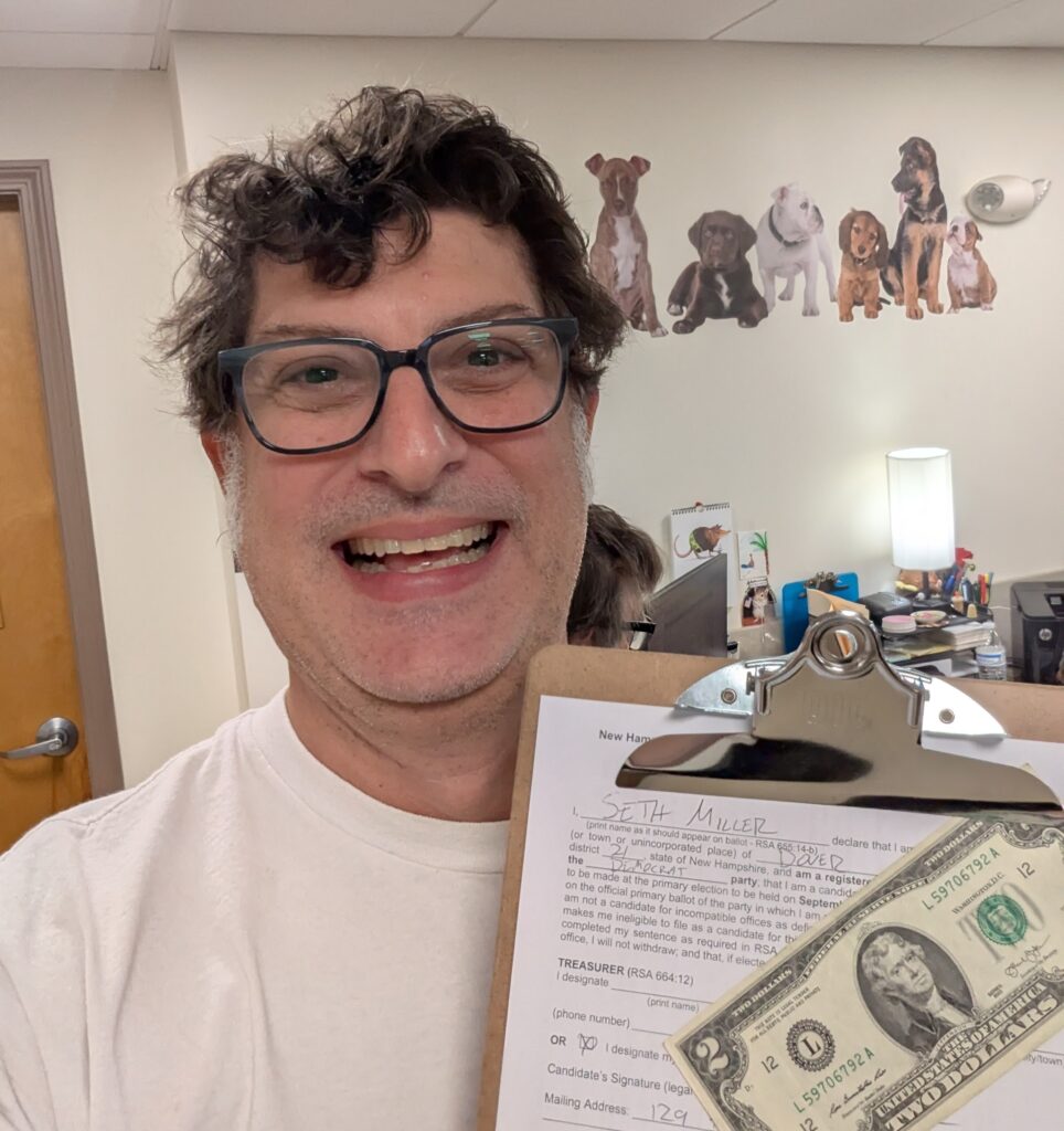 Selfie at the City Clerk's office, with my re-election filing and the $2 fee ready to pay.